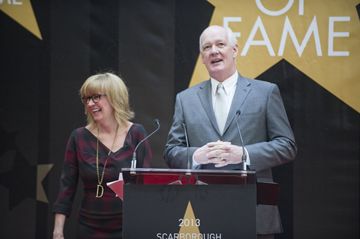 Hosts Colin Mochrie and Deb McGrath welcome guests to the Scarborough Walk of Fame induction ceremony May 15.