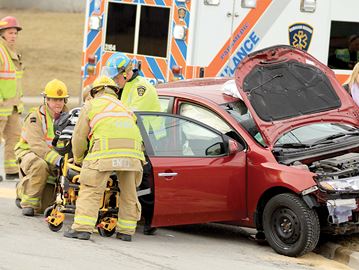 OSHAWA -- One person was taken to hospital after a two-vehicle crash caused by a driver running a stop sign Tuesday morning in Oshawa. March 22, 2016.