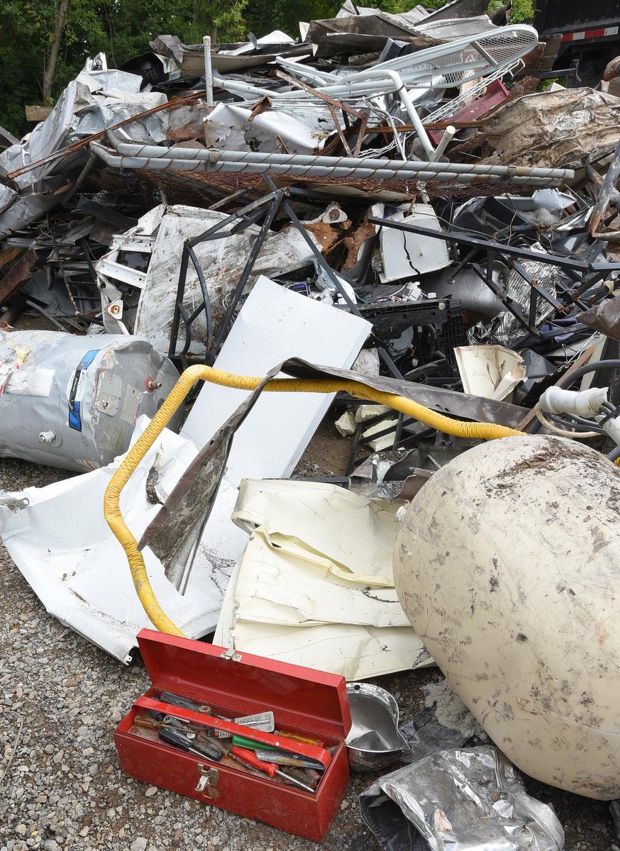 Personal items found in the Rutherford house included a tool box, a sewing machine, stereo equipment and an ironing board. A demolition crew worker noticed a box poking out of the rubble: a metal, fireproof safe. 