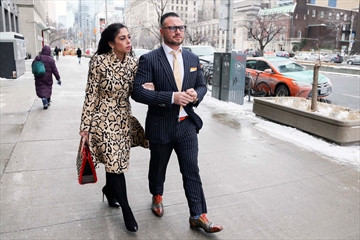 CI-CURNEW5 TORONTO, ON - FEBRUARY 5 - Andrew Curnew and his wife Dr. Rita Kilislian walk on University Ave., February 5, 2018. Bridle Path multi-millionaire Andrew Curnew's 11 year wait to clear his name moves to a Toronto court on Monday. He is suing his former criminal lawyer, Arun Maini. Andrew Francis Wallace/Toronto Star