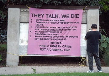 A banner at the Overdose Awareness Day Vigil in Victoria Park in Kitchener in 2021.