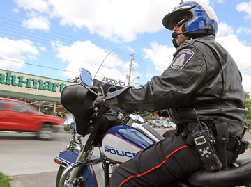 Const. Veerman observes the actions of drivers as they pass by.