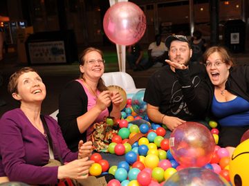 June, Jennifer, Peter and Andra share a laugh as they all take a seat and meet new friends.