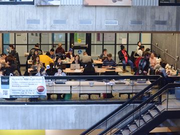 University of Guelph students gather at tables in a crowded study space on the University Centre's second floor. A renovation to the student centre, set to begin next month, will aim to provide more of this kind of space for students within the existing building.