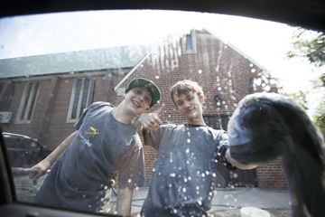 Scouts Michael Ford, left, and Taylor Colman admire their work during the 132nd Toronto Scout Troop's fundraising car wash held Saturday at Leaside Presbyterian Church. Proceeds from the event will benefit the troop's trip to the Canadian Jamboree at Sylvan Lake, Alberta July 6-13.