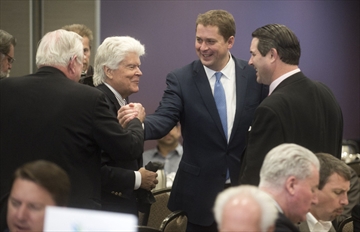 Andrew Scheer, Leader of the Conservative Party of Canada, greets people at the Greater Kitchener Waterloo Chamber of Commerce luncheon on Friday.