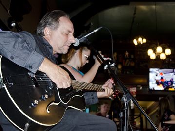 Local musicians came together Saturday evening to Different Strokes for a tribute to Todd Pyper, who lost his battle to cancer last week. Pyper was a local musician and owner of Rude Clown Music recording label as well as SoundWorks Production. He was also a key organizers for the annual Happening at the Forty. Performing is Pyper's best friend John Restas and Carli Rose. The event raised money for McNally House Hospice.