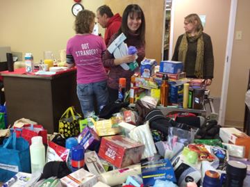 Mary Davis organizes Christmas bags for distribution to Chalmers Community Services Centre guests.