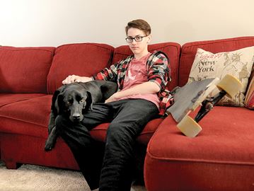 OSHAWA -- Kimberley-Anne Alda Hobbs and her son, Quinten, are hoping to identify the driver of a vehicle that failed to remain after Quentin was struck Thursday, May 11, at the intersection of Harmony Road and Coldstream Drive in Oshawa. Quinten was treated at hospital for scrapes and bruises, and remained home on Friday as he recovered on the couch with the family dog Kepolo. May 12, 2017.