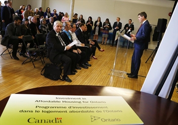 City of Peterborough director of planning and development services Jeffrey Humble addresses the crowd during a grand opening ceremony celebrating affordable housing projects in Peterborough and the City of Kawartha Lakes on Friday April 21, 2017 at The Mount Community Centre in Peterborough, Ont. Humble is leaving his position with the city.