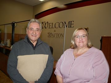 Greg Watton, Employment Ontario's managing director, and Donna Pinch, Employment Ontario employee liaison co-ordinator, in the lobby at Watton Employment Services Inc. in Cobourg.