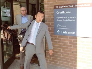 York Regional Police Const. Young Min von Seefried leaves the Newmarket Courthouse after a court date in his sexual assault trial. Aug. 23, 2016.