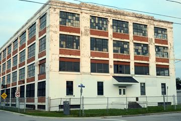 A developer has confirmed that it will be converting the former Uniroyal plant at the corner of Huron and Alice streets into condominiums. The city has approved a request to remove hundreds of trees from the south end of the property due to soil contamination.