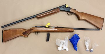 A woman faces several charges after police seized drugs and two guns during the execution of a search warrant Thursday in south Oshawa.