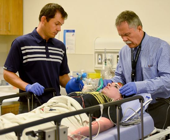 Stephanie Marlin undergoing electroconvulsive therapy. Anesthesiologist Dr. Greg Kostandoff and Dr. Gary Hasey prepare Stephanie for treatment. | Barry Gray, The Hamilton Spectator