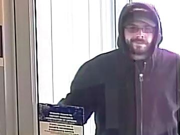 DURHAM -- Durham police have released an image of a suspect in three robberies at financial institutions in Oshawa, Newcastle and Bowmanville over the course of four days recently. The suspect may be driving a silver Dodge pickup, police said. April 27, 2016.