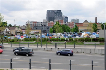  Dozens of tents are set up at the corner of Victoria and Weber streets in Kitchener. 