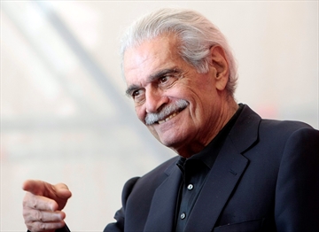 FILE - In this Thursday, Sept. 10, 2009 file photo, Egyptian actor Omar Sharif gestures during the photo call for the film 'Al Mosafer (The Traveller)' at the 66th edition of the Venice Film Festival in Venice, Italy. Sharif has died in a Cairo hospital of a heart attack, his agent said on Friday, July 10, 2015. (AP Photo/Andrew Medichini, File)