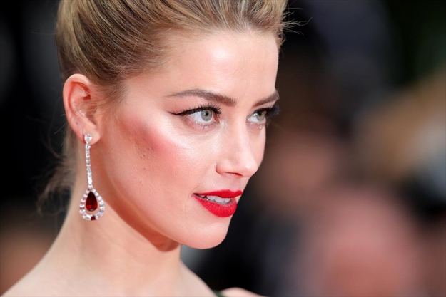 Amber Heard Slammed Over Racist Tweet About Ice Checkpoints 