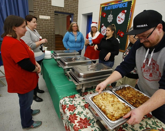 Rare Grill House owners treat R.F. Downey Public School students to