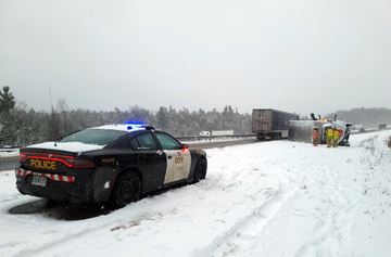 Emergency crews worked to clear a vehicle that rolled over on Hwy. 401 in Brighton on Saturday, Nov. 19.