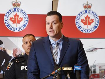 AJAX -- Detective Sergeant Ryan Connolly spoke during a Durham Regional Police press conference at Ajax Town hall on Friday, Dec. 1. Two brothers, who live in the north Ajax neighbourhood where multiple carjackings occurred, are now facing a combined 66 charges for these and other violent incidents. Trenell Ottley, 24, and his brother Trevell Ottley, 21, both of Hesketh Road in Ajax, have been charged in connection with nine incidents. December 1, 2017.