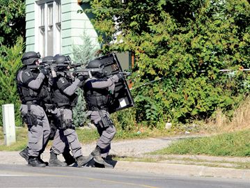 Tactical Officers Raid Oshawa Rooming House