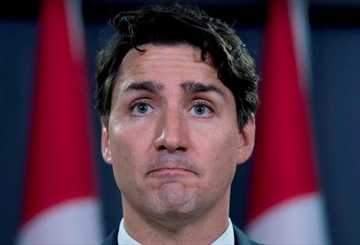 Prime Minister Justin Trudeau pauses as he speaks at a media availability at the National Press Theatre in Ottawa on Tuesday, June 27, 2017. THE CANADIAN PRESS/Justin Tang