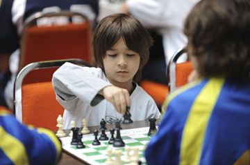 St. Cyril Catholic School student Jean-Paul Passarelli makes a move during the Toronto Catholic District School Board Team Chess City Finals Friday. Passsarelli's team from St. Cyril finished in first, Monsignior John Corrigan in second and St. Robert in third.