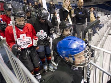 Members of the Parkdale Flames minor bantam hockey team take the ice at Ricoh Coliseum Tuesday morning for a practice with the Toronto Marlies. (Mar. 12, 2013)