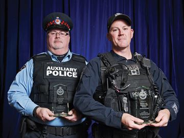 AJAX -- Aux. Const. Clint Neuls, left, and Det. Const. Bryan Armstrong were recipients of awards for excellence in policing and service to the community at the annual Durham Police Appreciation Dinner and Awards Night at Deer Creek Banquet Facility Oct. 27. The two men stopped an attempted suicide from a train bridge over Hwy. 401 in March. Oct. 27, 2016.