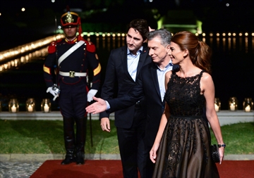 Justin Trudeau, with Argentine President Mauricio Macri and his wife Juliana Awada in Buenos Aires, now leads a government in crisis.It’s not a crisis Trudeau made, but he’s stuck with it — the crisis of globalization, writes Paul Wells.
