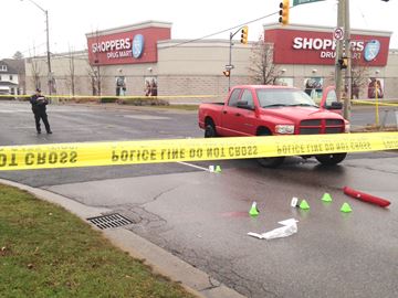 OSHAWA -- A woman in her 50s is in serious condition after being struck by a vehicle at the Bond Street-Park Road intersection of Oshawa early this morning, said Durham Regional Police.