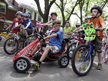 The streets were filled with 'bikers' including Hayden Copping, 9, seated centre, who got on his low rider for a day of fun.