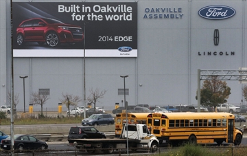 ford oakville plant ontario jobs outside 1000 october sign