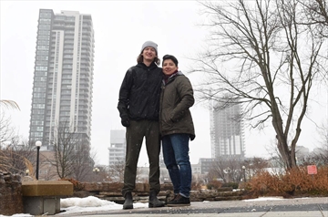 Local street outreach workers Jesse Burt, left, and Sara Escobar in Victoria Park on Monday.