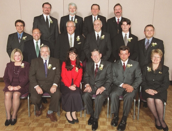 Thursday January 4 , 2001-Incoming City of Hamilton council poses with Bob Wade before start of inaugural meeting of the council of the Corporation of the 