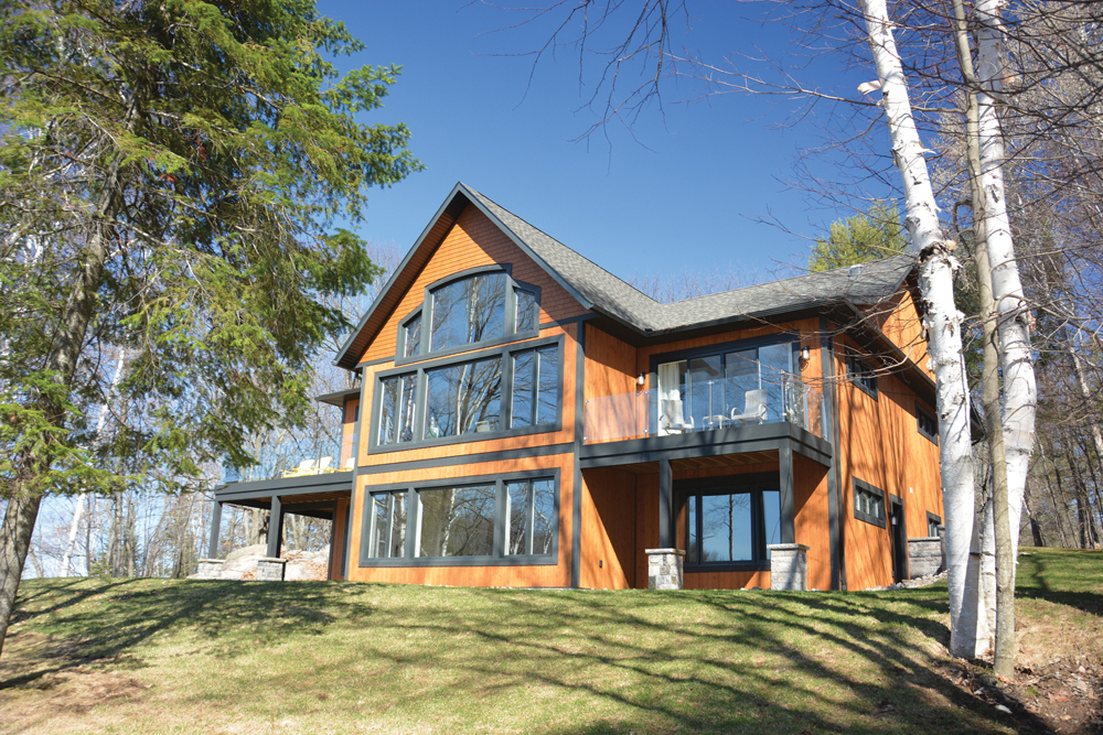 Mary Lake cottage cradled in Muskoka granite