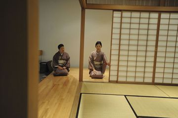 Student Takako Yoshimoto learns the correct way to open the door from instructor Sumiko Yamashita during a Japanese Tea Ceremony class Friday at the Japanese Canadian Cultural Centre.